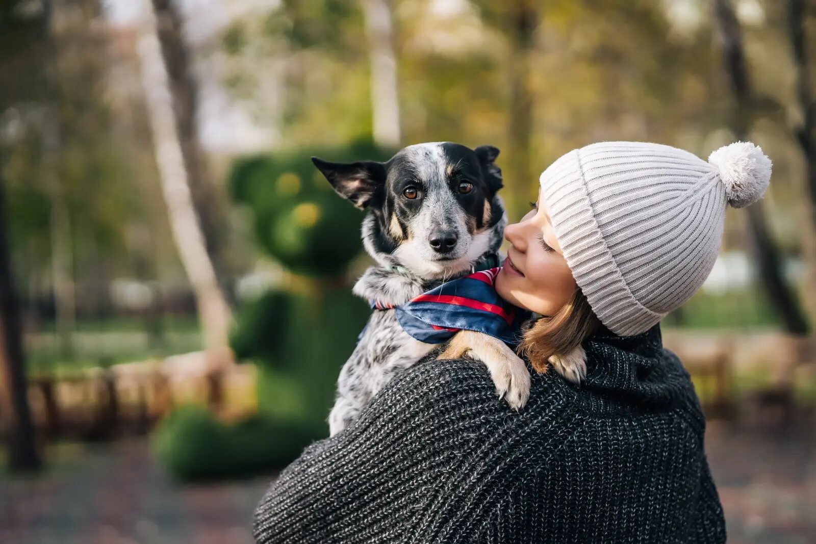 Guest holding her dog in Whistler Village